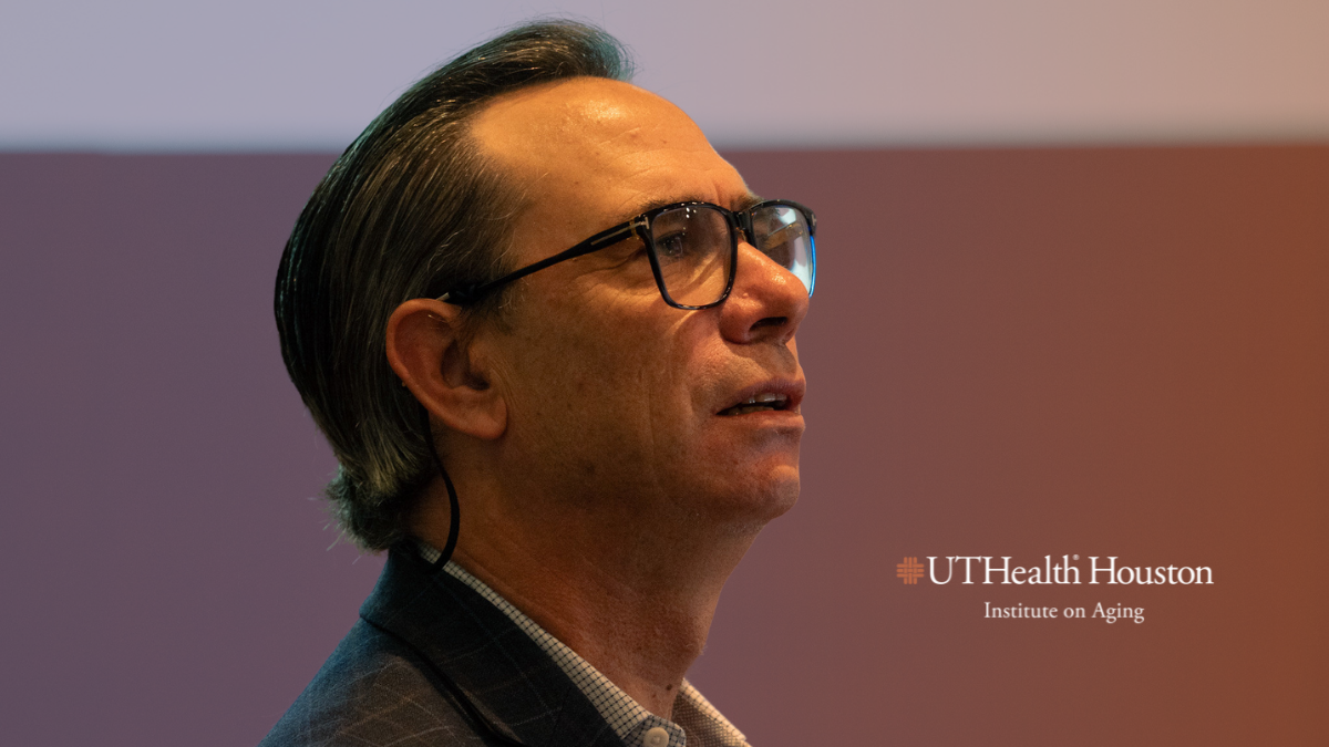 Keynote Speaker Musi talking at Symposium on Aging Research