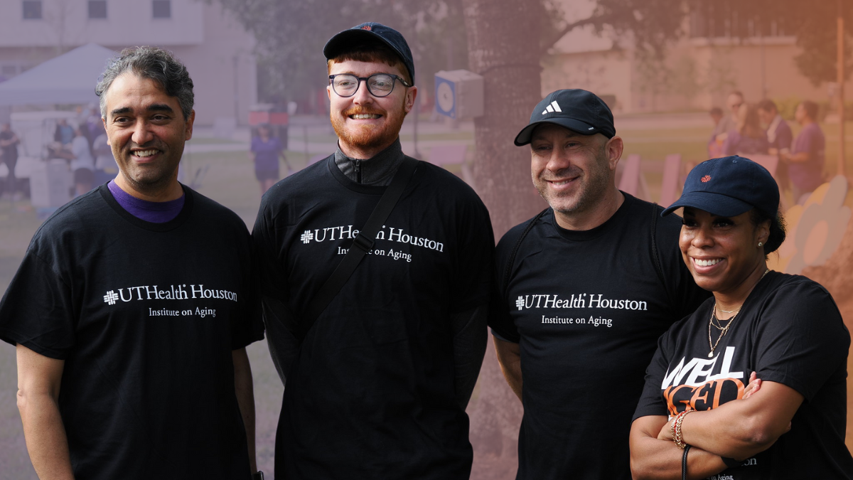 Four members from the Institute on Aging smiling at the Walk to end alzheimer's