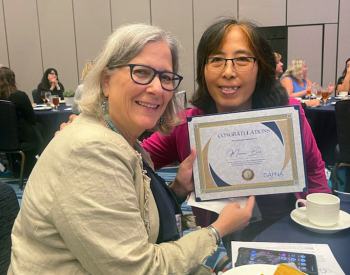 Maureen Beck, DNP, MSN, left, and Suyan Bi, MSN, AGNP-C, with UTHealth Houston won first place at Gerontological Advanced Practice Nurses Association 2022 National Conference for their study on weight loss in residents of assisted living facilities.