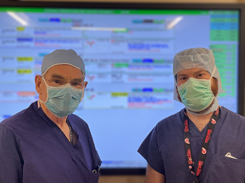 James Kellam, MD, (left) and his son Patrick Kellam, MD, (right) preform two surgeries together for the very first time.  (Photo courtesy of Patrick Kellam)