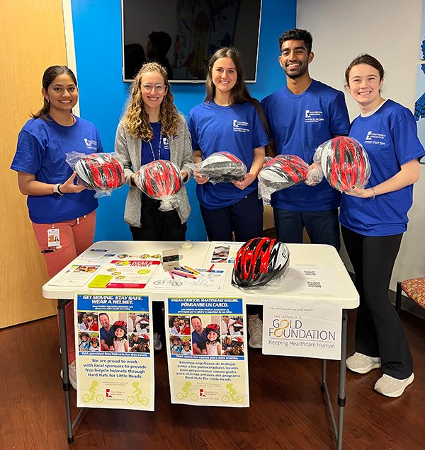 Students from McGovern Medical School at UTHealth Houston volunteered for the event, which was part of the statewide effort Hard Hats for Little Heads. (Photo by Simone Sonnier/UT Physicians)