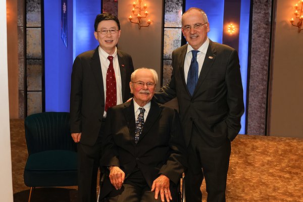 From left, Dean Jiajie Zhang, PhD; D. Bradley McWilliams; and UTHealth Houston President Giuseppe Colasurdo, MD, celebrate a $22 million gift from McWilliams to the School of Biomedical Informatics. (Photo by Priscilla Dickson Photography)