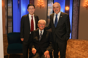 From left, Dean Jiajie Zhang, PhD; D. Bradley McWilliams; and UTHealth Houston President Giuseppe Colasurdo, MD, celebrate a $22 million gift from McWilliams to the School of Biomedical Informatics. (Photo by Priscilla Dickson Photography)