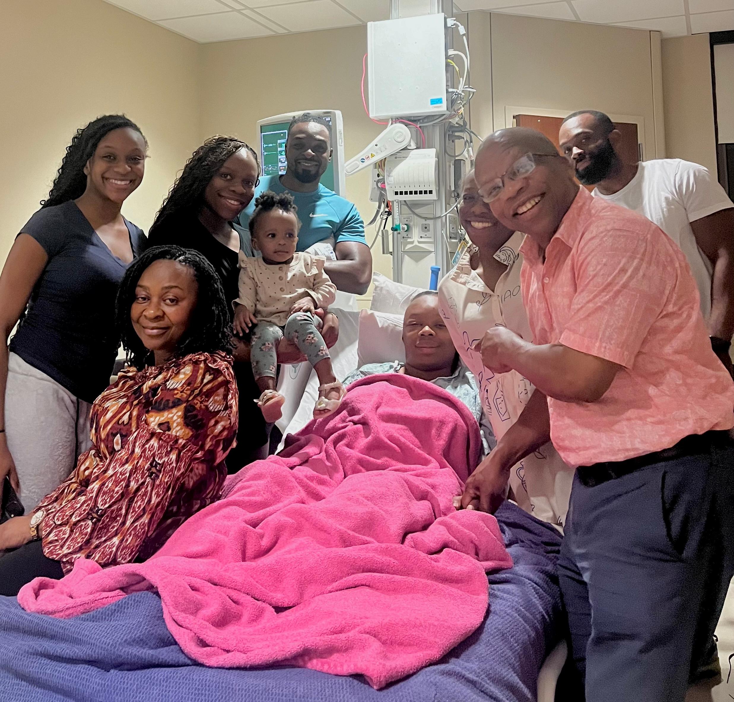 Cherechi Abakwue, 29, surrounded by family as she recovers from a 10-hour brain surgery performed by Jacques J. Morcos, MD. (Photo by  Cherechi Abakwue)
