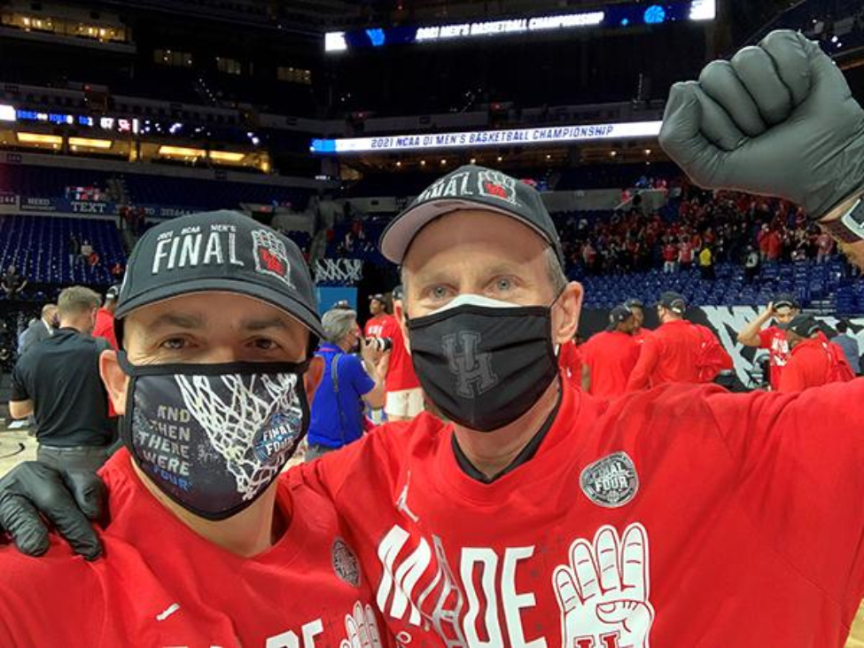 Photo of Paul Shupe, MD, and John Houston, associate athletics trainer at the University of Houston, celebrating the Cougars heading to the Final Four. (Photo courtesy of Paul Shupe, MD) Photo of Paul Shupe, MD, and John Houston, associate athletics trainer at the University of Houston, celebrating the Cougars heading to the Final Four. (Photo courtesy of Paul Shupe, MD)